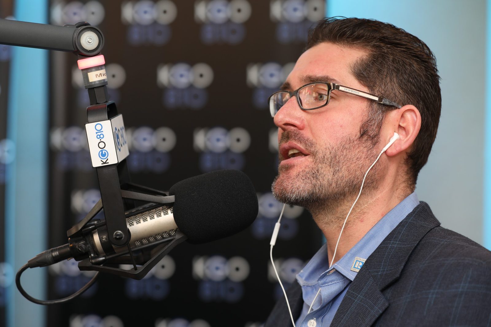 Greg talking into the KGO 810 mic