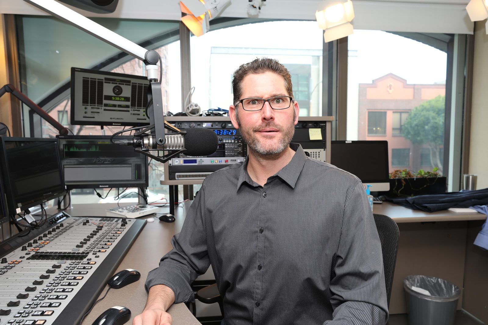 Greg at the board in the KGO studio