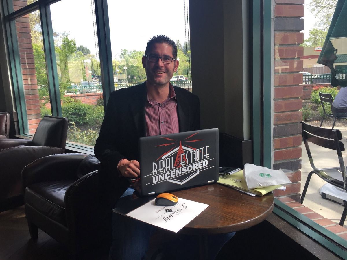Greg with a Real Estate Uncensored laptop