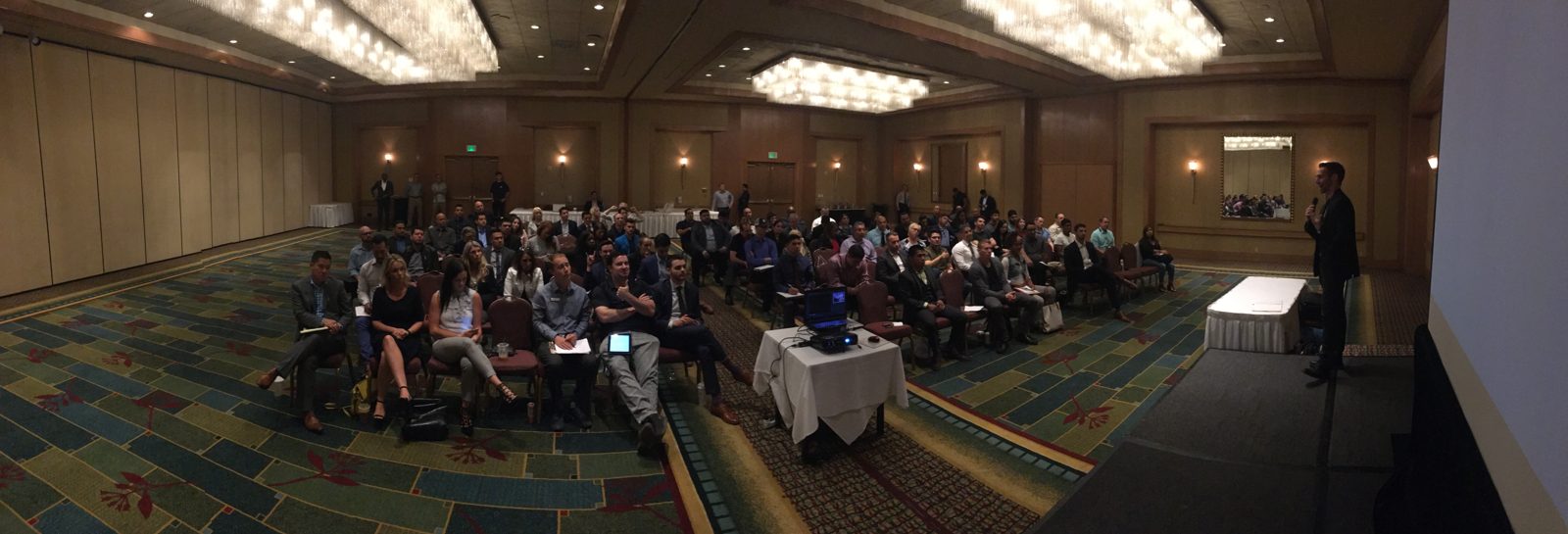 Greg teaching a packed ballroom